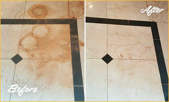 Before and After Picture of a Flatiron District Marble Floor Cleaned to Eliminate Rust Stains